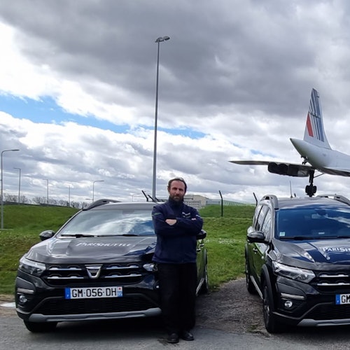 París: Traslado de ida y vuelta en taxi del aeropuerto Charles de Gaulle a Disneylandia